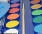 Acuarelas de colores vivos que se mezclan con agua y permiten a los niños crear sus propios colores