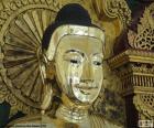 Imagen de la cabeza de un buda de oro en Myanmar