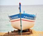 Barca varada en la playa