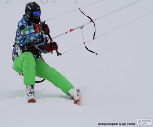 Puzzle de Un snowkiter en acción